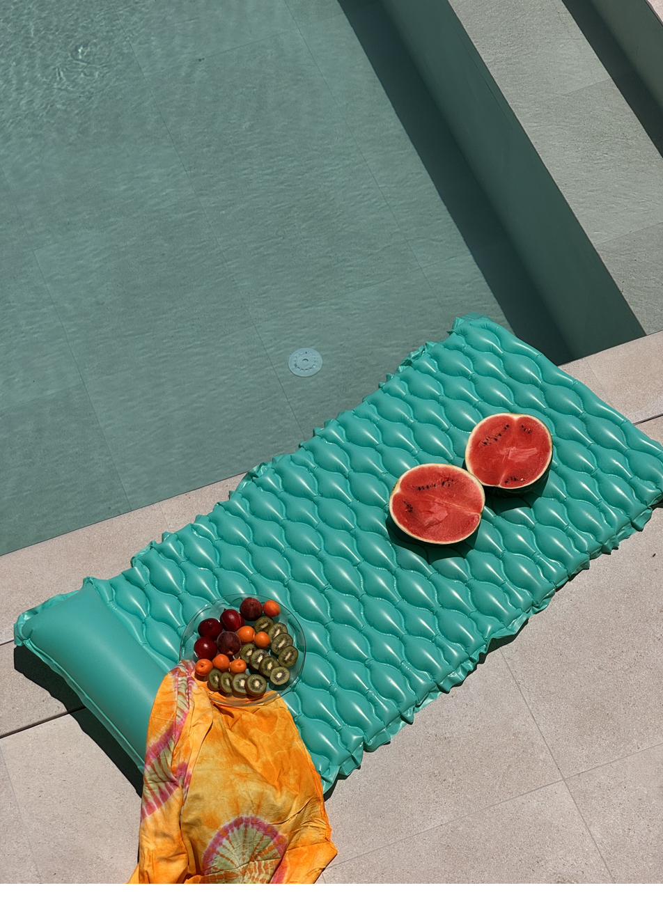 Home22 poolside loungers and garden